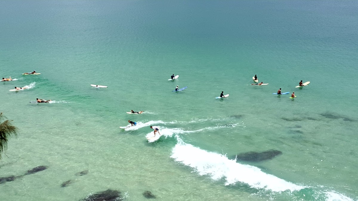 Learn to surf (or just swim) at The Pass