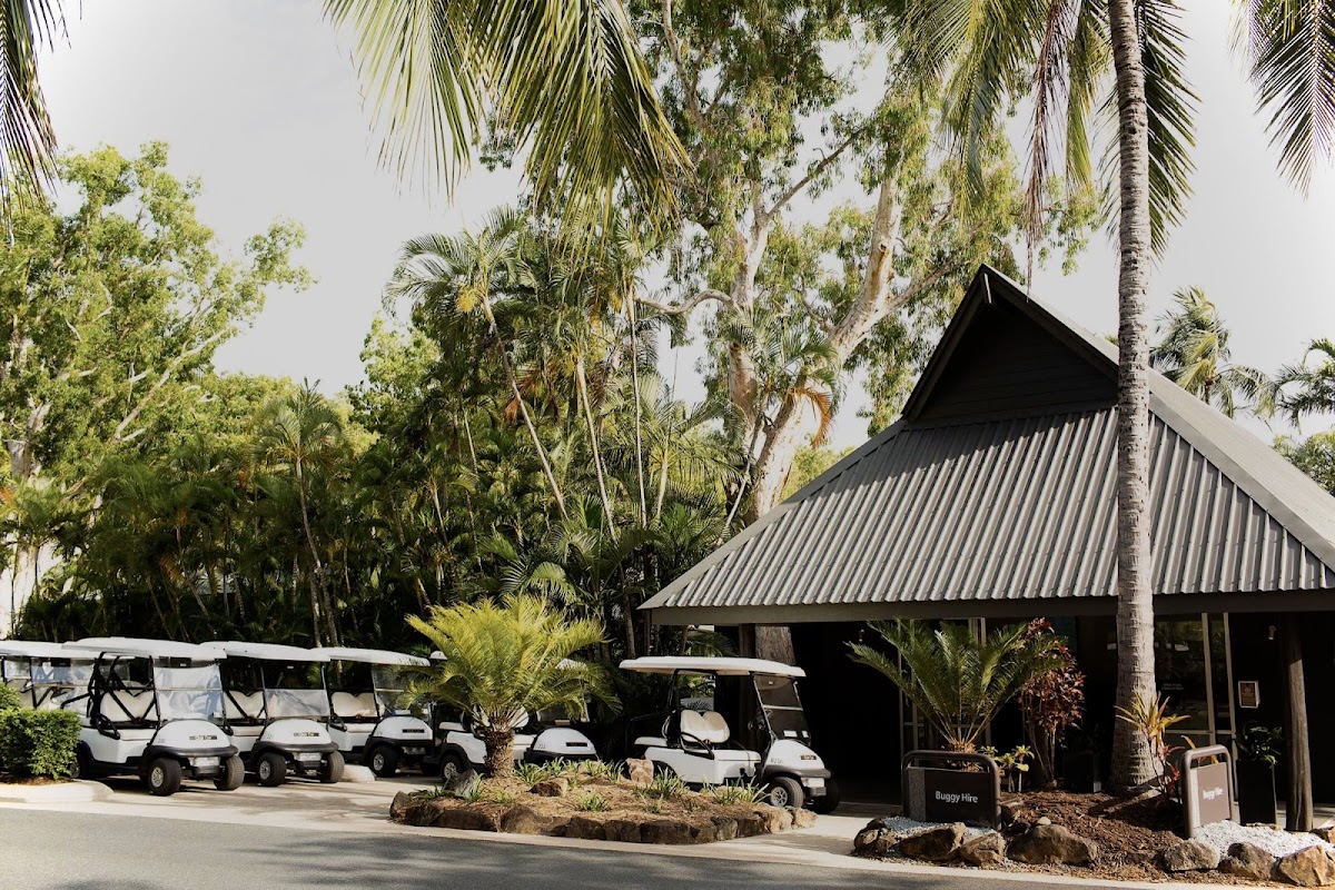 Hire a golf buggy and lap the island